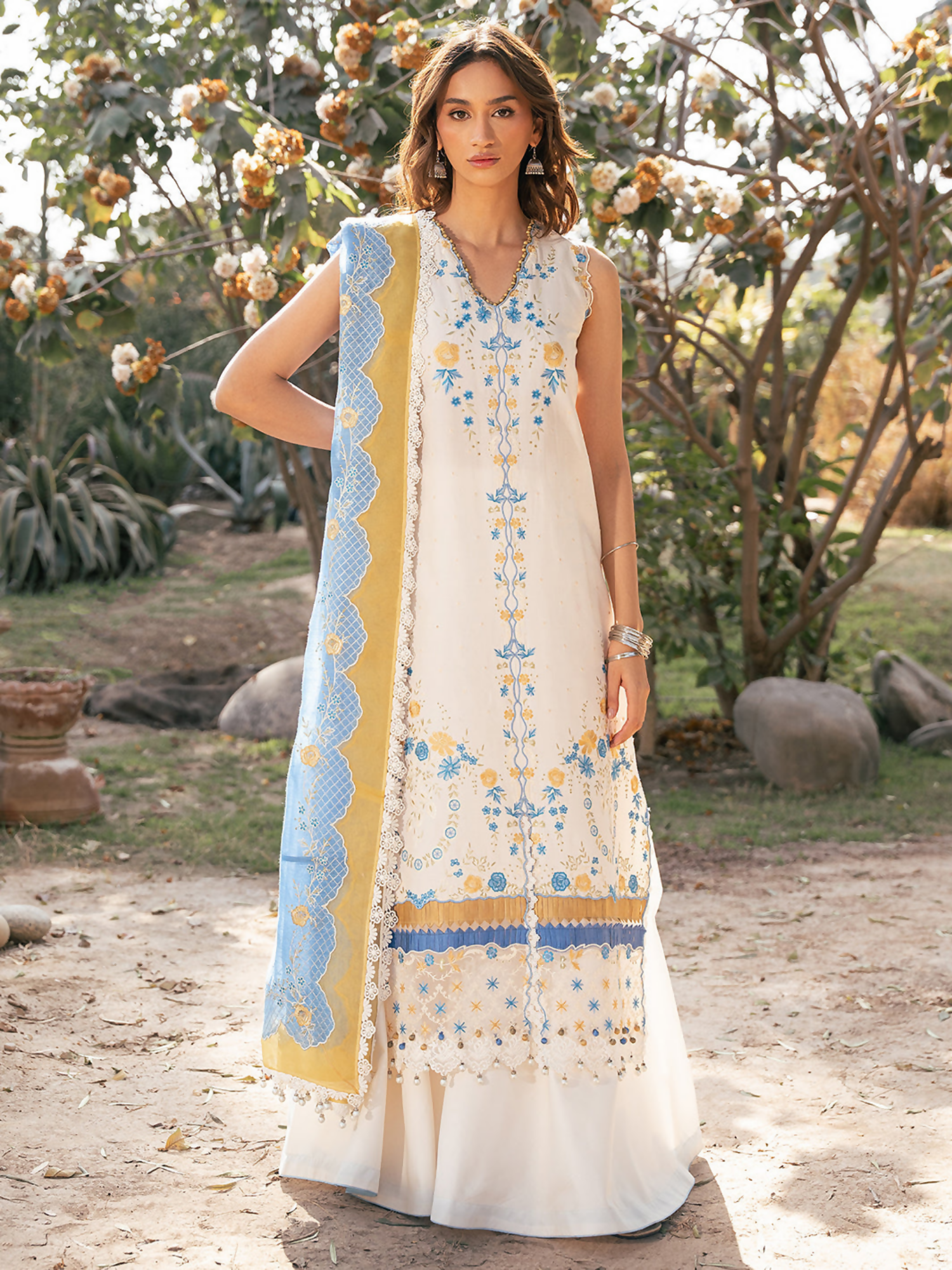 Elegant embroidered lawn suit with organza lace detailing and embroidered cotton mix dupatta.
