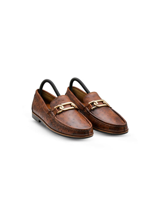 Premium leather loafers with a gold buckle detail, perfect for formal and smart-casual wear.