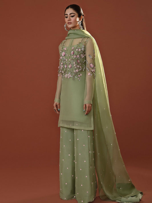 Pistachio pink organza outfit with floral sequin and pearl embellishments, palazzo pants, and hand-embellished dupatta by Hussain Rehar.