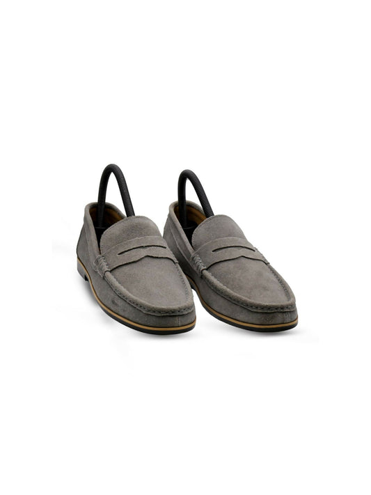Classic suede penny loafers with a soft finish and signature penny slot detail, combining comfort and timeless style for any occasion.