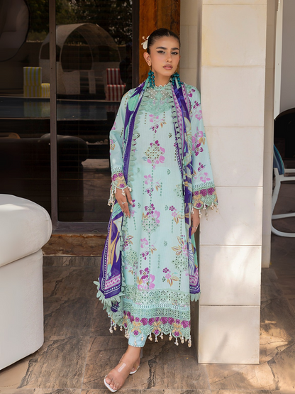 Woman wearing a sky blue unstitched 3 piece suit with colorful chikankari floral embroidery, chiffon dupatta, and cotton trouser.