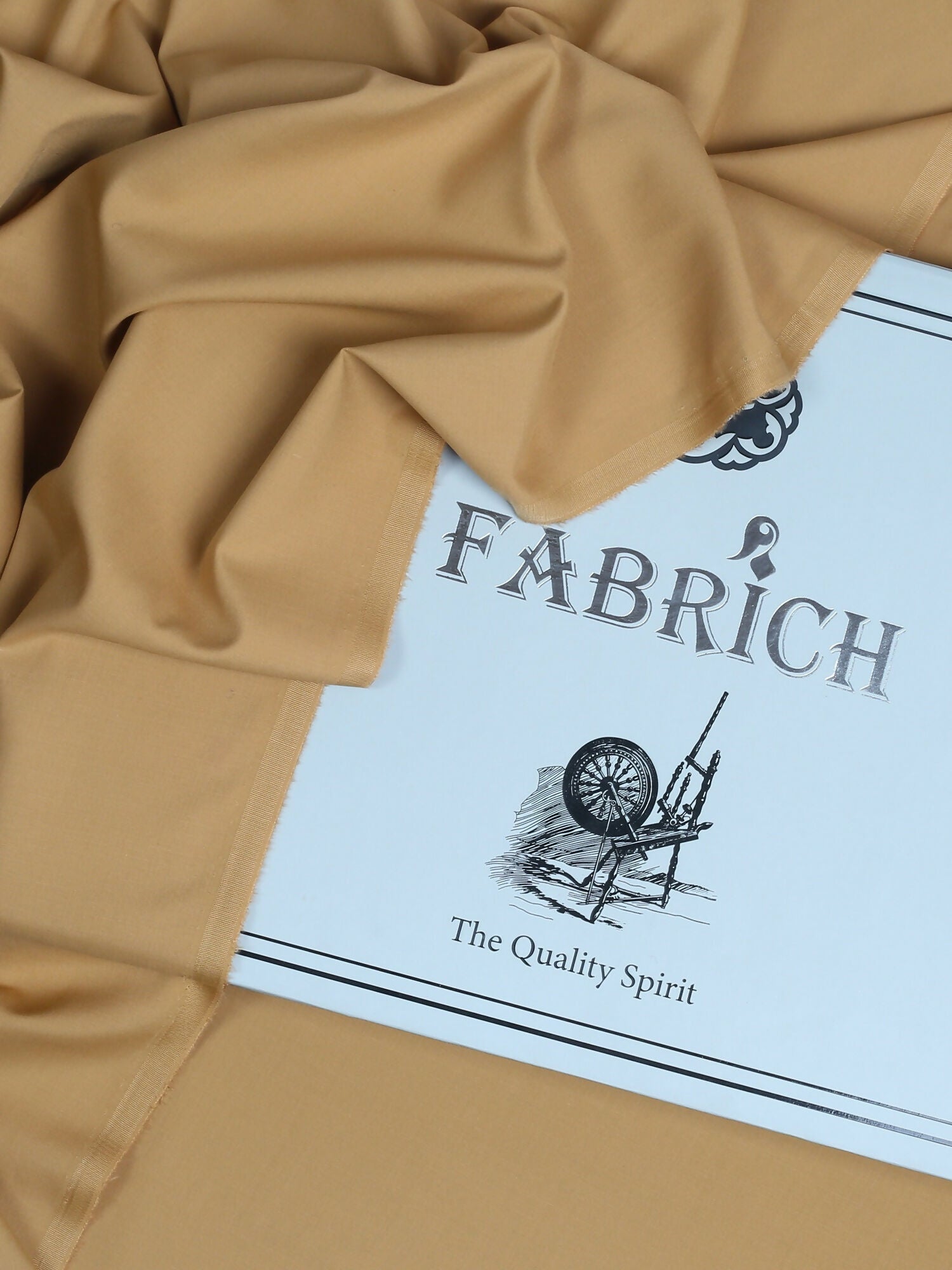 Mustard men’s unstitched wash n wear fabric by Fabrich, offering a luxurious soft-finish and refined details like designer buttons and brand label.