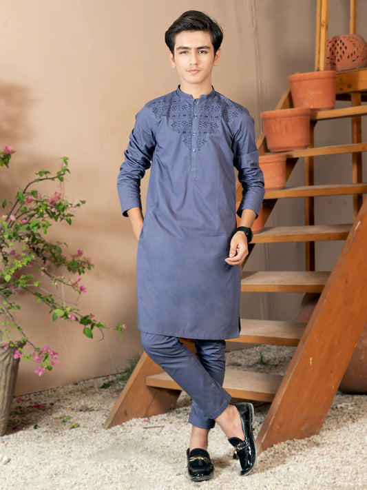 Boy wearing embroidered cotton kurta with matching trouser, mandarin collar, full sleeves, and regular fit stitched 2-piece suit for traditional wear