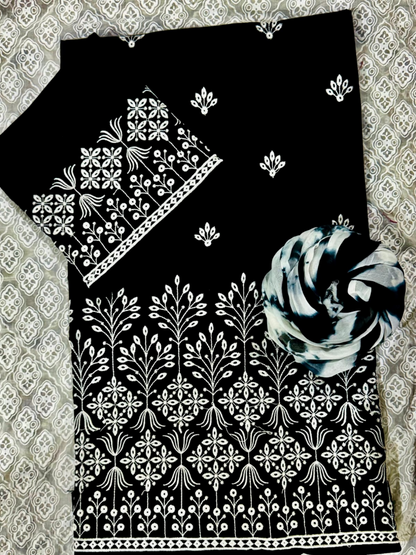 Fehm unstitched black lawn 2-piece suit with embroidered front motifs, plain back, embroidered sleeves, and tie-and-dye lawn dupatta.