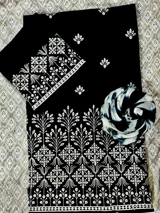 Fehm unstitched black lawn 2-piece suit with embroidered front motifs, plain back, embroidered sleeves, and tie-and-dye lawn dupatta.
