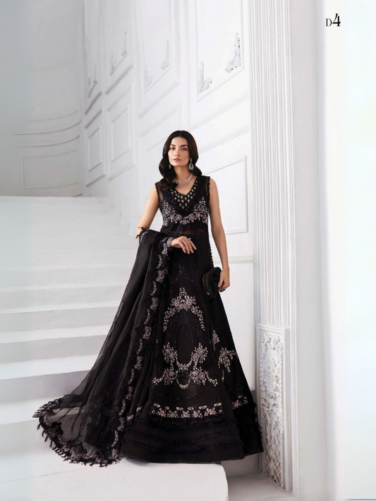 Woman wearing an unstitched 3-piece luxury organza suit with hand-embellished embroidery, pearl detailing, raw silk trouser, and embroidered dupatta.