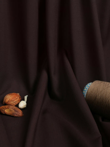 Lead-toned men’s unstitched wash n wear fabric by Fabrich, featuring a soft finish, designer buttons, and brand label.