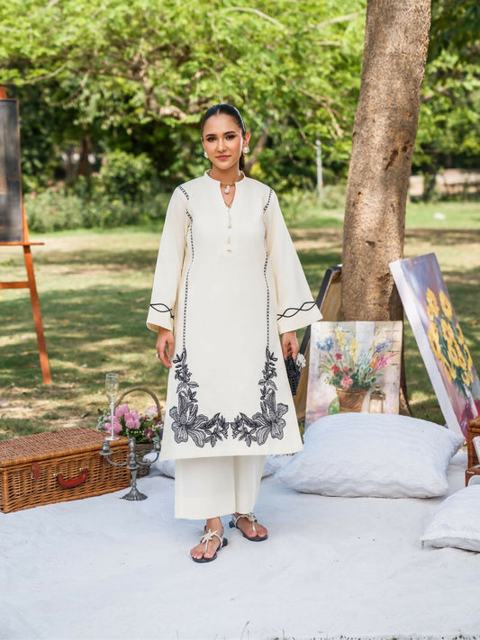 Vanilla Ice stitched two-piece suit “Lisa” with embroidered front and sleeves, fabric detailing, paired with straight trousers by Sehrish Kanwal