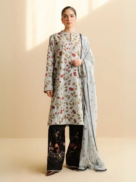 Unstitched 3-piece printed suit with printed lawn shirt, patterned cambric trouser, and simple silk dupatta.