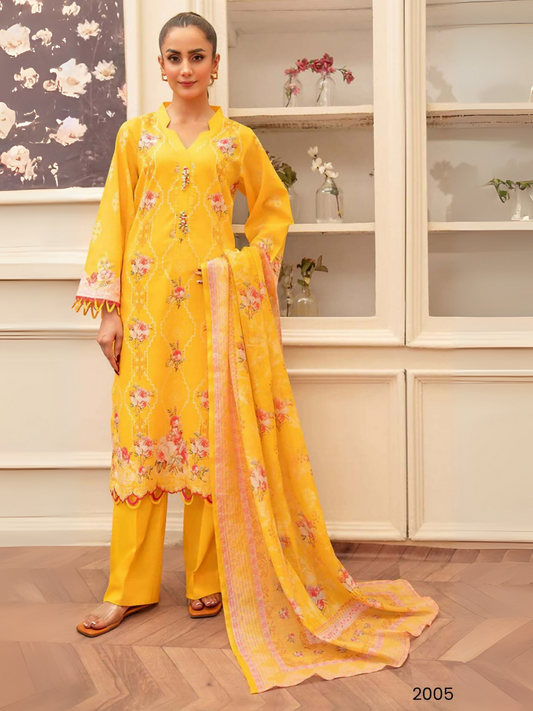 Bright yellow unstitched 3-piece lawn suit by Sitara Studio featuring floral printed shirt, dyed trouser, and digital printed dupatta