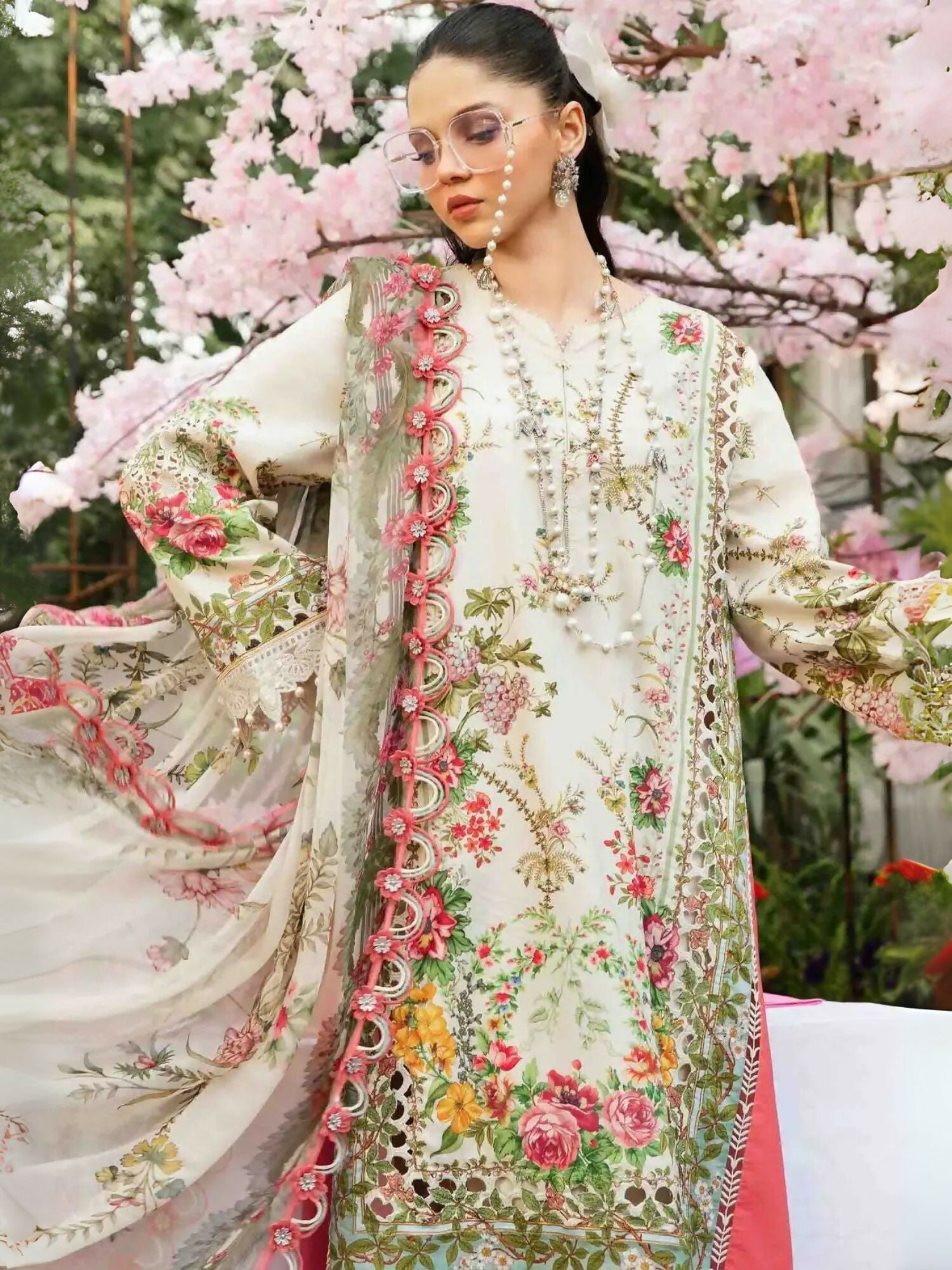 Unstitched 3-piece Maria.B lawn suit with embroidered organza patti and printed chiffon dupatta.