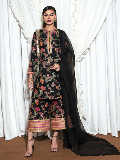 Regal raw silk stitched 3-piece suit Inky by HussainRehar featuring a block-printed shirt with gold sequins, multicolor bugle beads, and tassel neckline, paired with block-printed culottes with a bordered design and an organza dupatta sprayed with black sequins and finished with a scalloped border