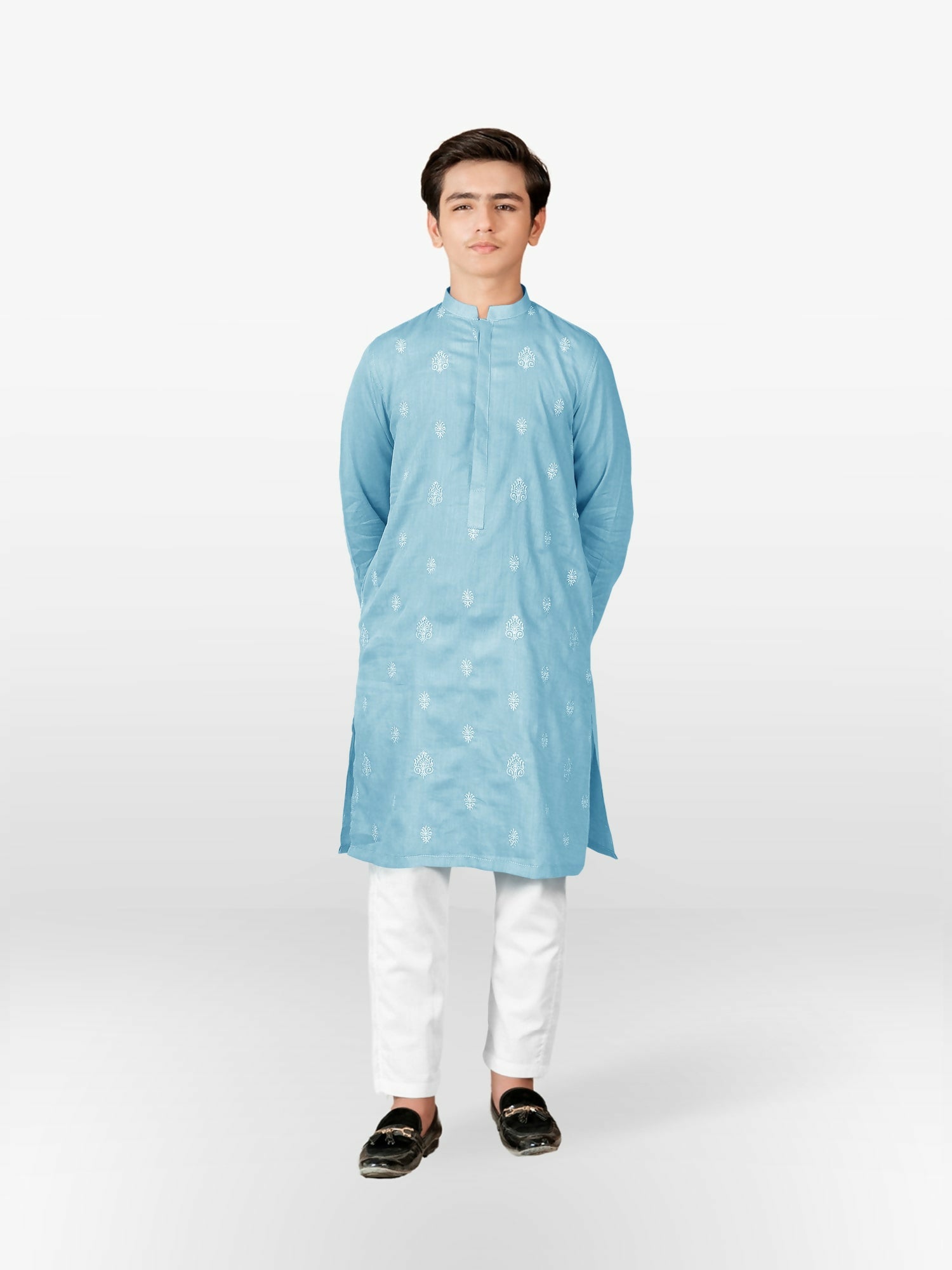 Boy wearing cotton stitched kurta with mandarin collar, full sleeves, regular fit, and delicately embroidered front – traditional ethnic wear for kids.