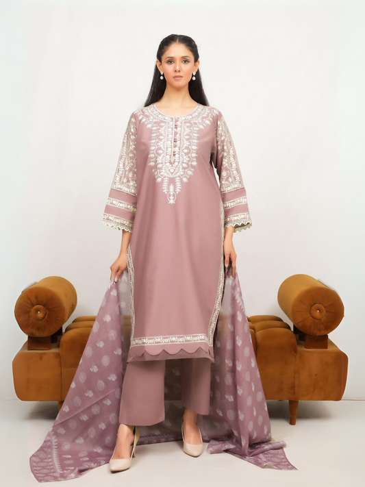 Woman wearing stitched 3-piece suit with delicate embroidery on straight-cut shirt, wide flared sleeves, digitally printed dupatta, and matching fitted trouser.