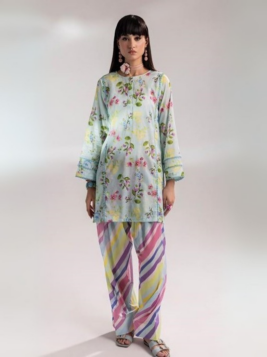 Woman wearing a pastel blue floral printed shirt with multicolor striped trousers from Parizad's unstitched lawn collection.