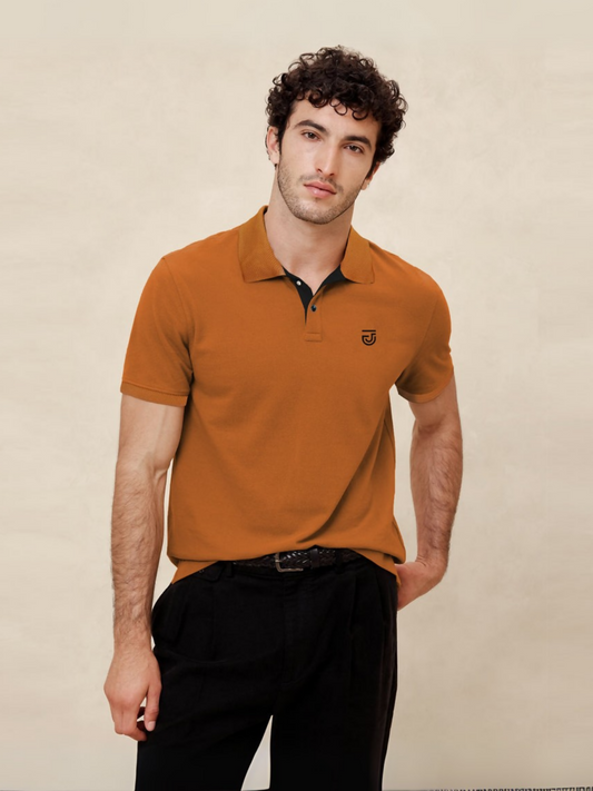 Men's short-sleeve polo shirt with jacquard textured collar, embroidered chest logo, ribbed cuffs, and a soft cotton-poly-viscose blend—ideal for smart-casual wear.