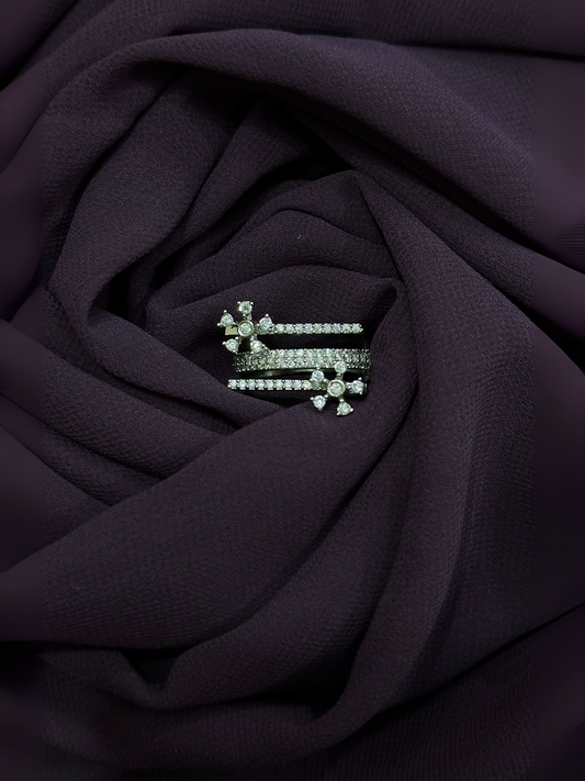 Glitter Jewellery triple-band silver ring with floral-shaped accents and encrusted stones.