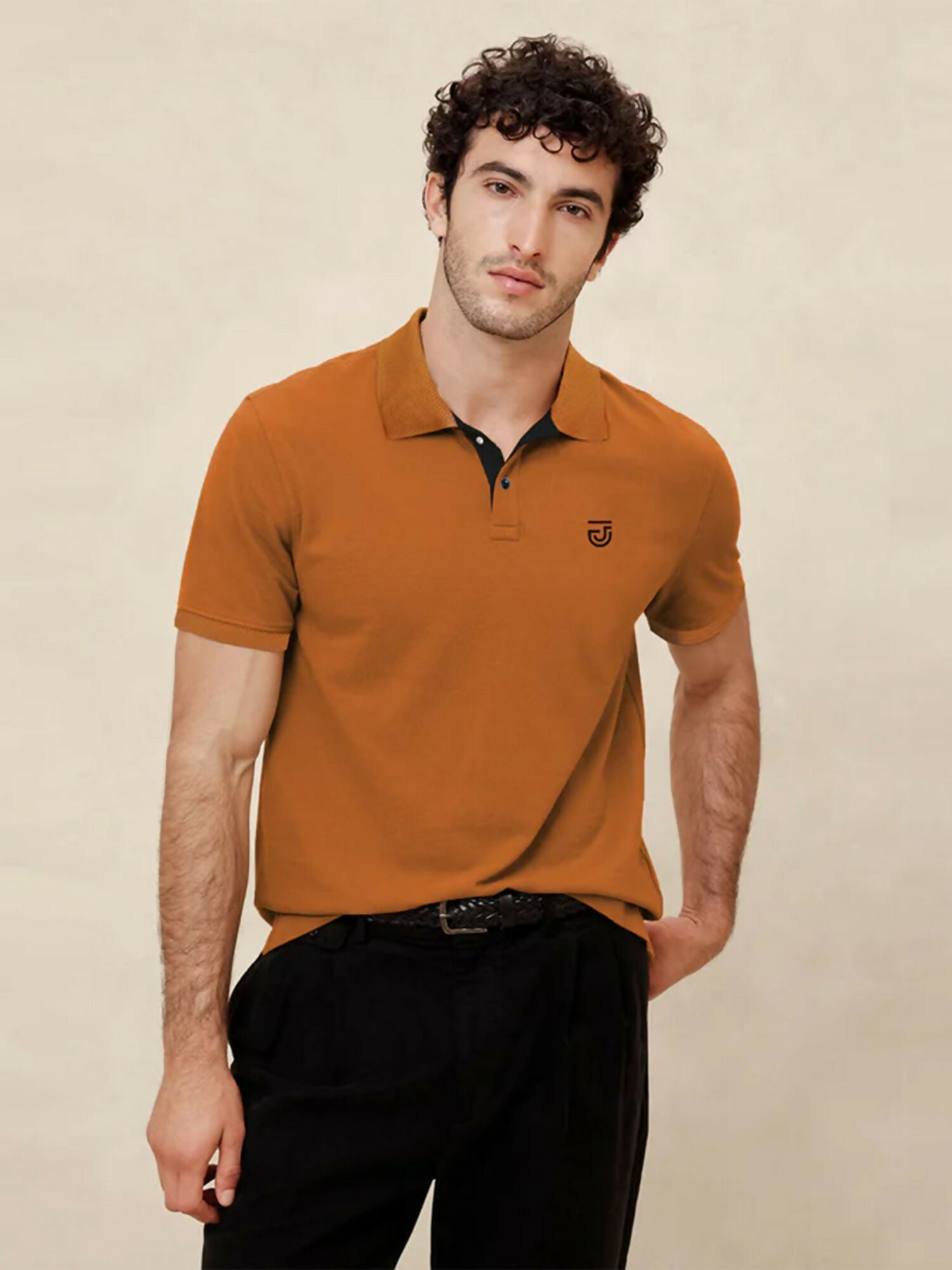 Jupiter jacquard knit textured collar western wear men’s polo shirt in cotton, polyester, and viscose blend with embroidery logo, ribbed cuffs, and side vents.