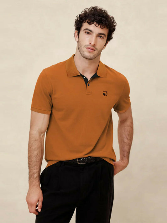 Jupiter jacquard knit textured collar western wear men’s polo shirt in cotton, polyester, and viscose blend with embroidery logo, ribbed cuffs, and side vents.