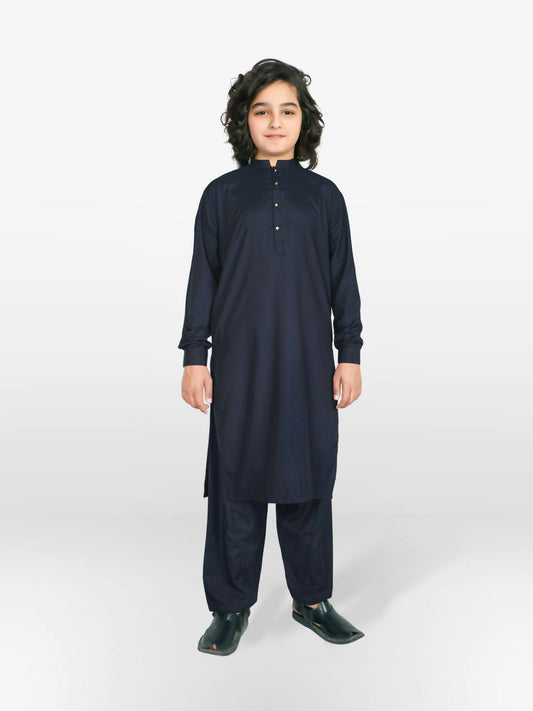 Boy wearing stitched cotton kurta shalwar suit with front buttons, mandarin collar, full sleeves, and regular fit, ideal for traditional and festive occasions.