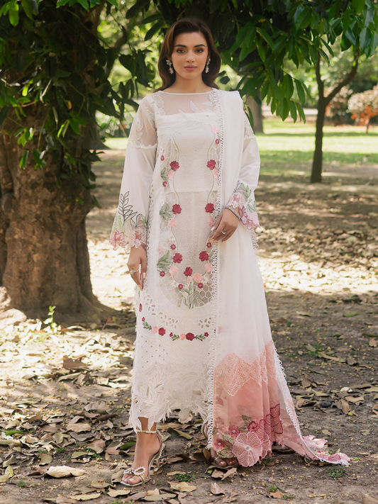 Girl standing wearing an unstitched 3-piece suit with embroidered lawn shirt front featuring center organza panel, neckline, daman, and sleeve patches, paired with an embroidered Monark dupatta and dyed Cambridge trouser with slip, ideal for festive or formal wear.
