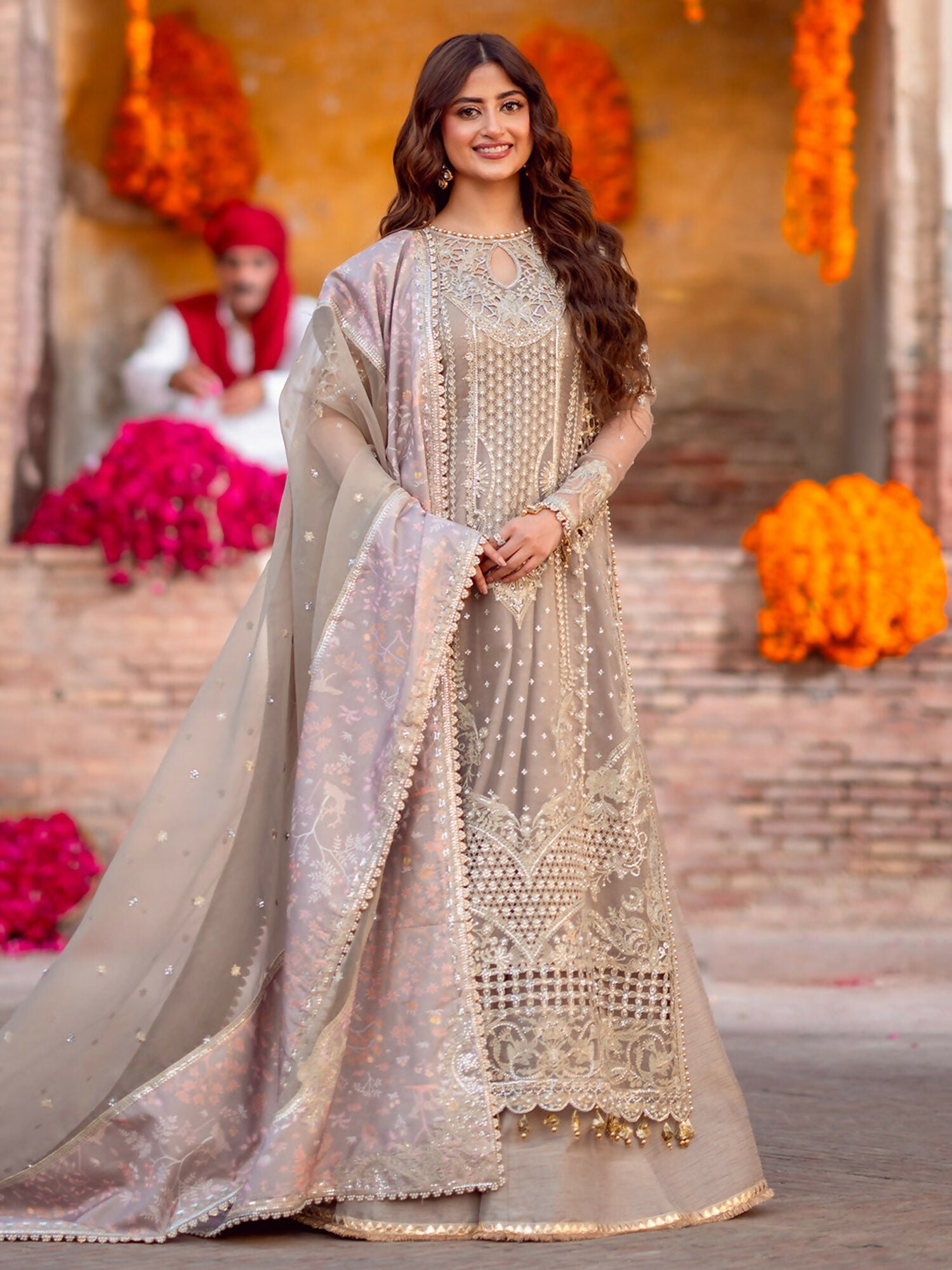 Binilyas unstitched luxury 3-piece suit with sequin embroidered organza shirt, embroidered organza dupatta with printed silk lace, and dyed silk trouser.