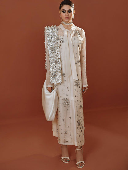 White long organza jacket outfit with silver embellishments, straight pants, and organza dupatta by Hussain Rehar.