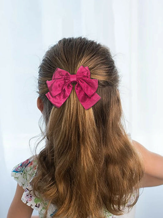 Girl wearing Glitter Jewellery hair bow with sparkling accents and gathered bow design