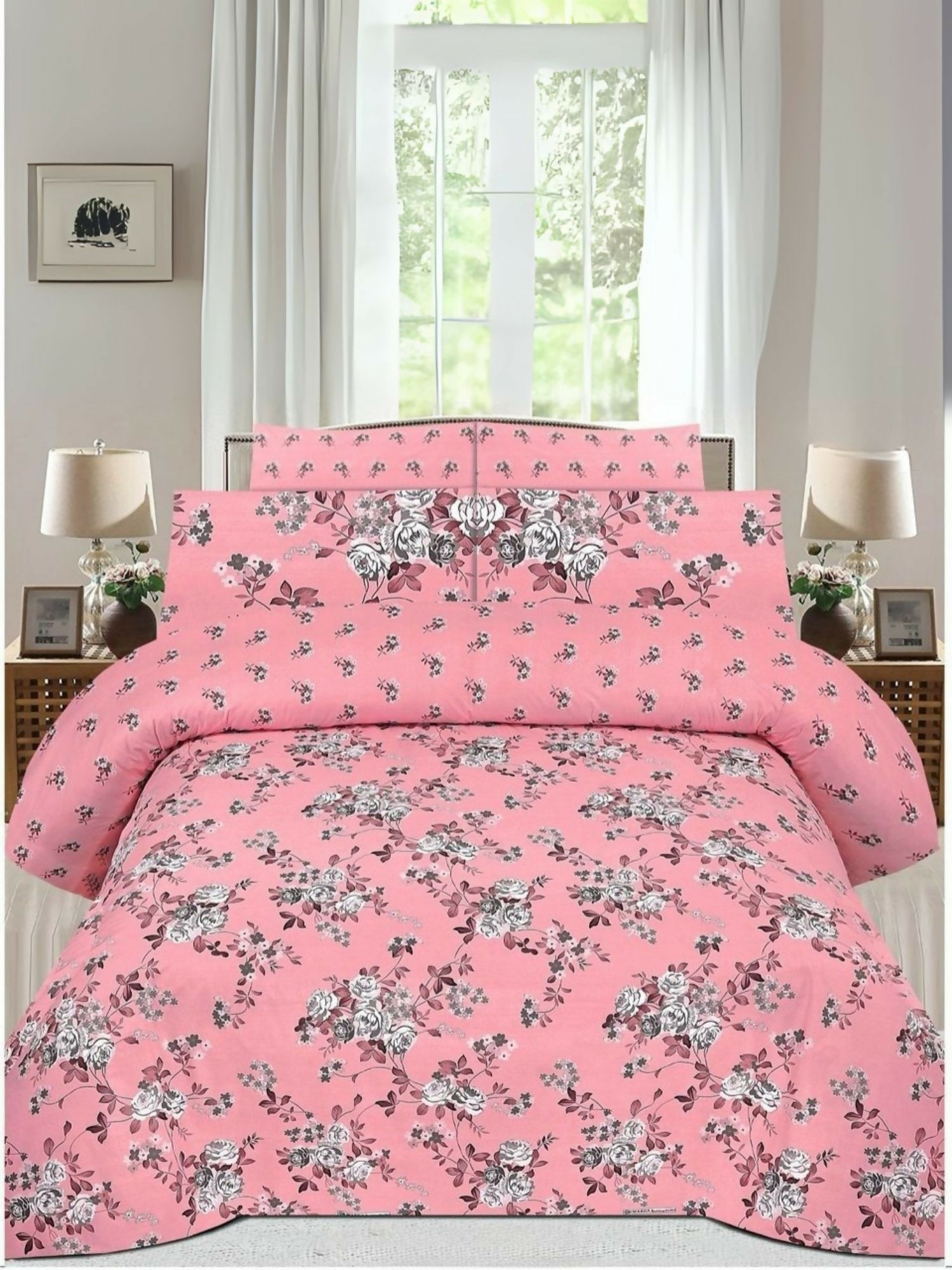 Danier 6pcs comforter set in pink with floral design – includes comforter, bedsheet, and four pillow covers.