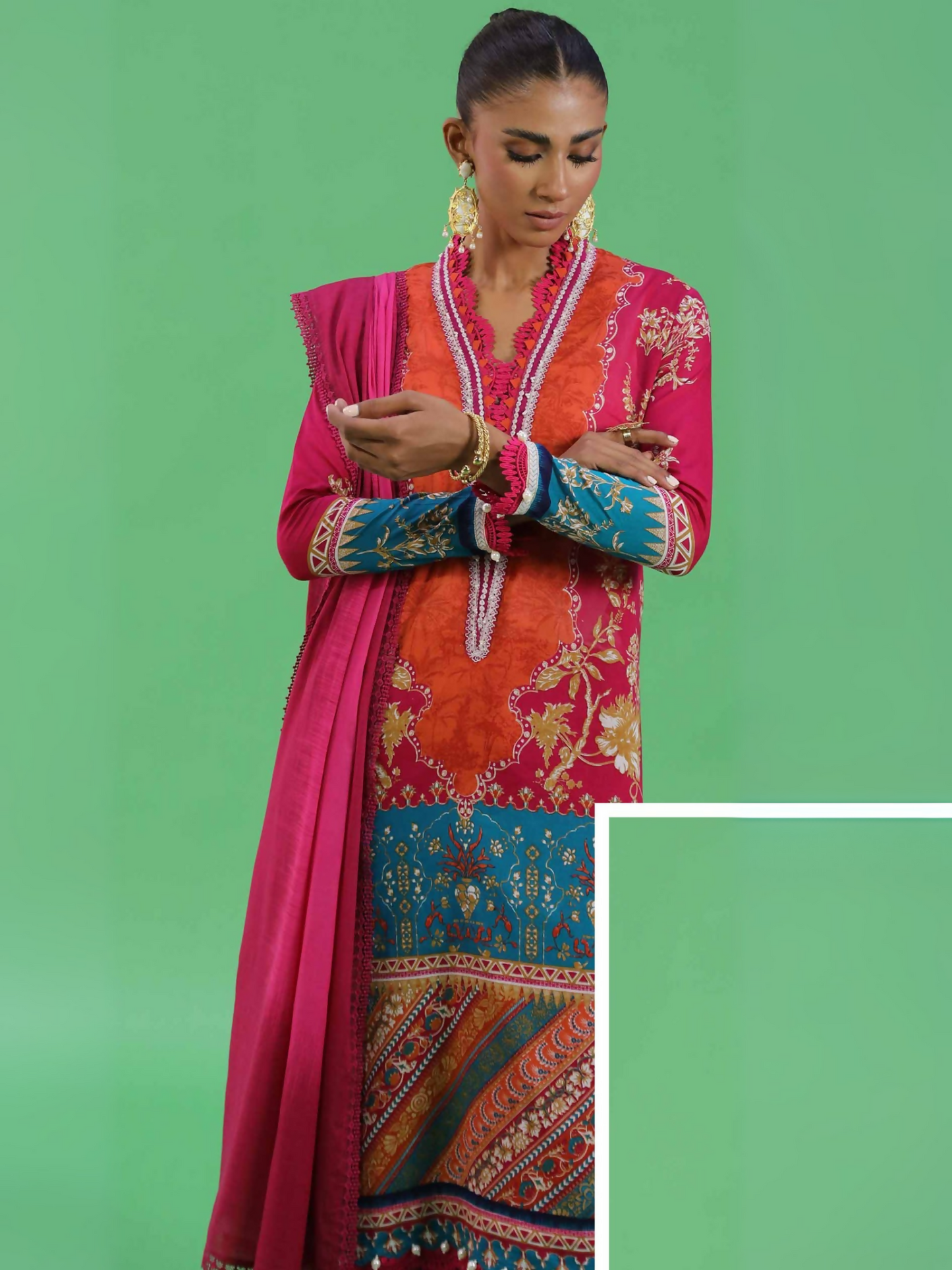 Unstitched 3-piece pink lawn suit featuring bold printed patterns with a matching dupatta and dyed cambric trouser.