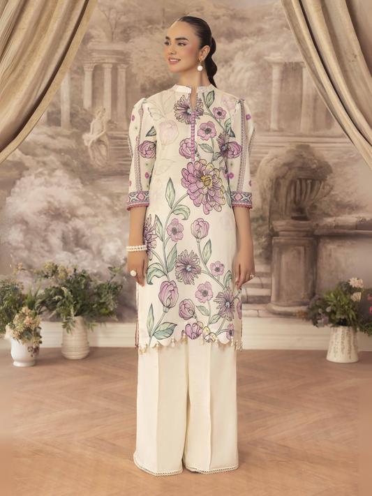 Woman wearing a white unstitched 2 piece lawn suit with pink floral printed shirt and plain cotton trouser.