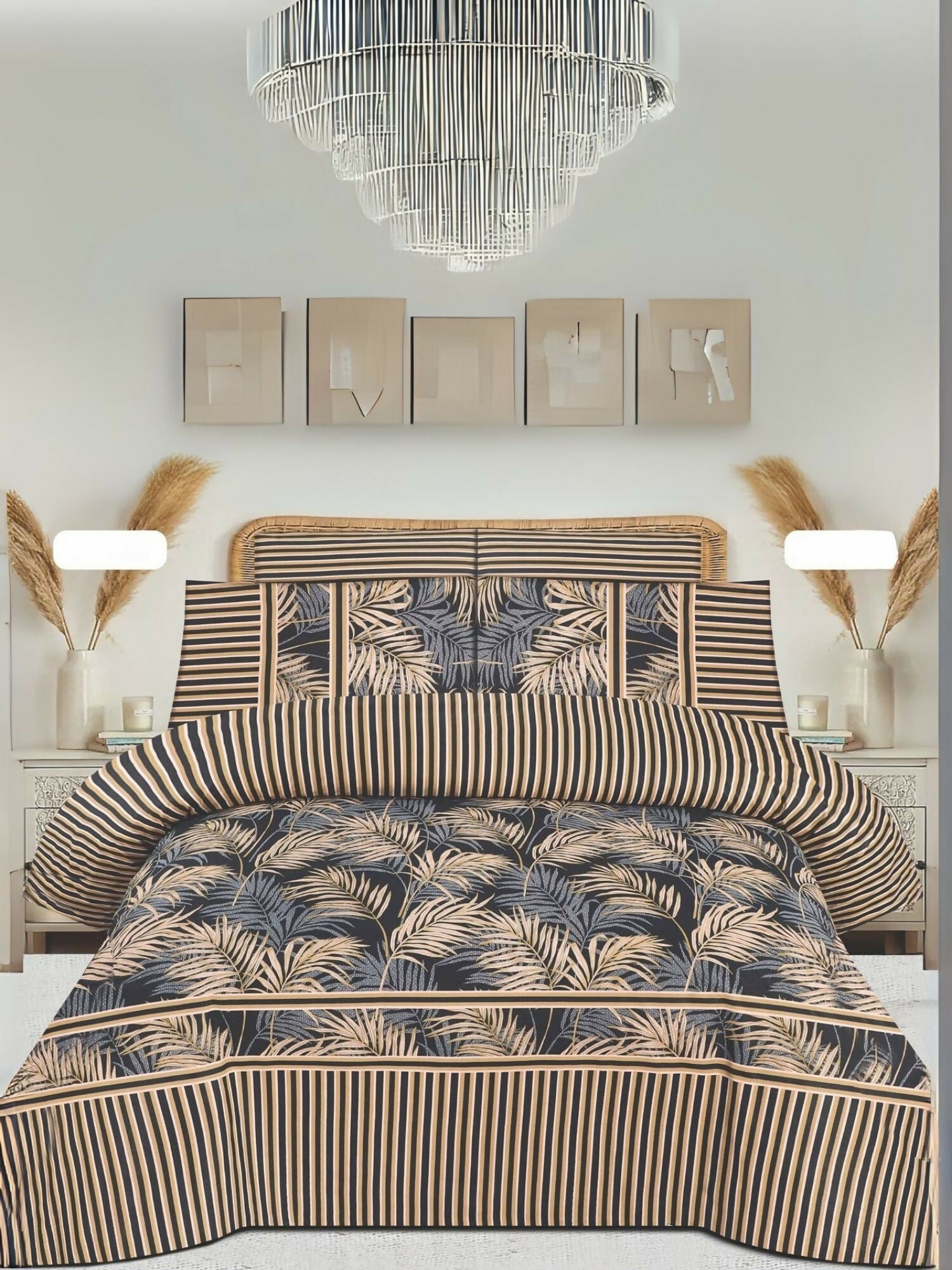 A beige king size bedsheet with black and beige leaf pattern, styled on a bed with matching pillow covers.