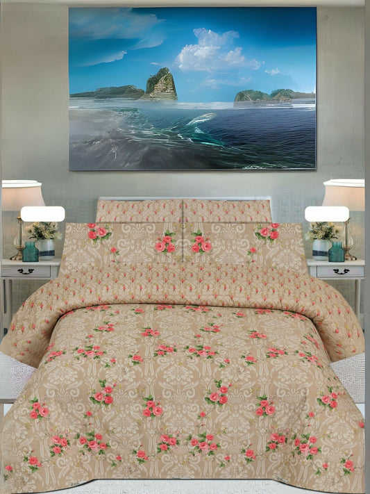 A beige king-size bedsheet set with soft pink floral print, paired with matching pillow covers, displayed neatly on a bed.