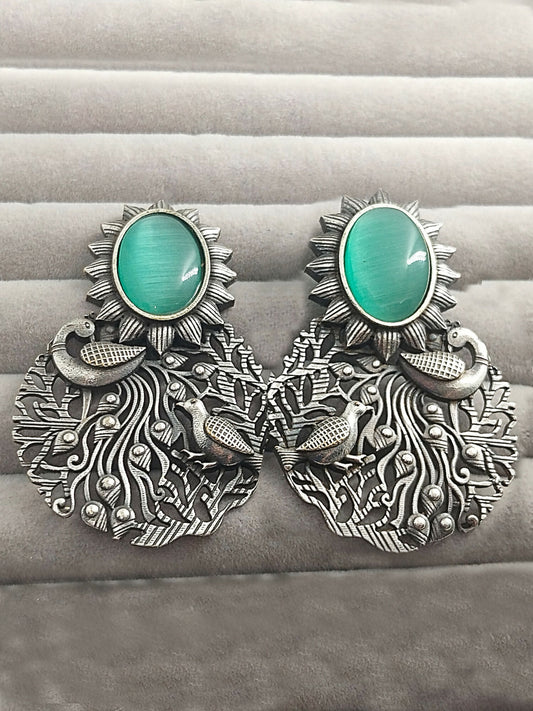 H&A Jewellery silver peacock motif earrings with aqua stone and sunburst design