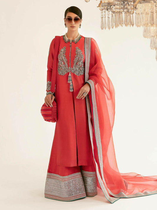 Hussain Rehar carrot pink raw silk three-piece outfit with embellished neckline, palazzo pants, and organza dupatta