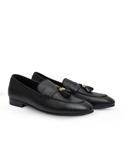Black cow leather shoes with a sleek finish and durable rubber sole, offering timeless style and everyday comfort.