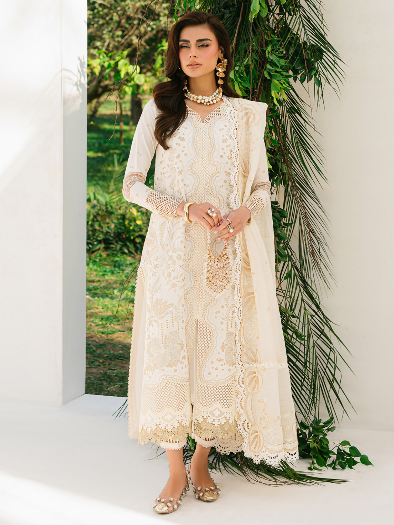 Classic embroidered lawn outfit with organza motifs and cotton trouser, paired with an embellished dupatta