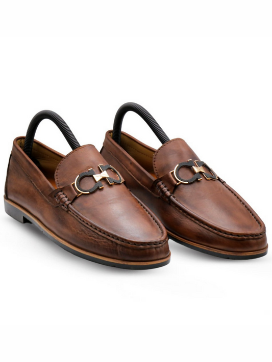 Italian handcrafted leather loafers with a smooth finish and classic silhouette, offering timeless elegance and all-day comfort.