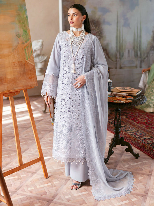 Stitched 3-piece suit from Mahnur Sophie Luxury Lawn with laser embroidered shirt, chiffon embroidered dupatta, and dyed trouser.