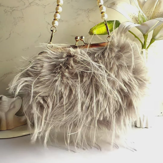 Grey Orya's Fur Clutch