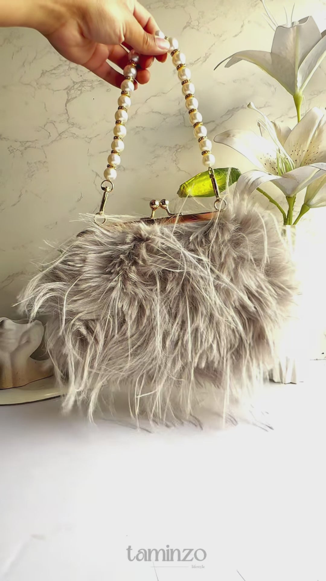 Grey Orya's Fur Clutch