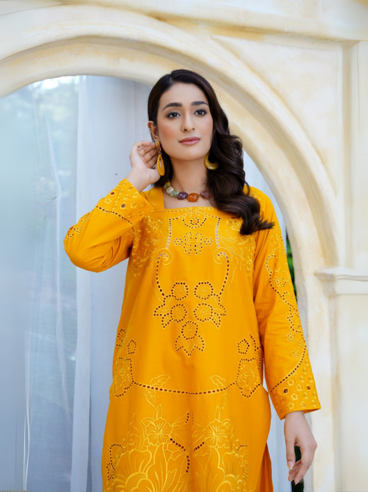Girl wearing Trends Forever mustard-yellow lawn cotton embroidered kurta with tonal floral motifs, cutwork accents, and matching shalwar; stitched 2-piece suit.