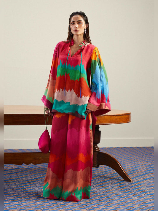 Hussain Rehar multicolored silk matching separate set with striped shirt featuring neckline strings and wide-leg palazzo pants.