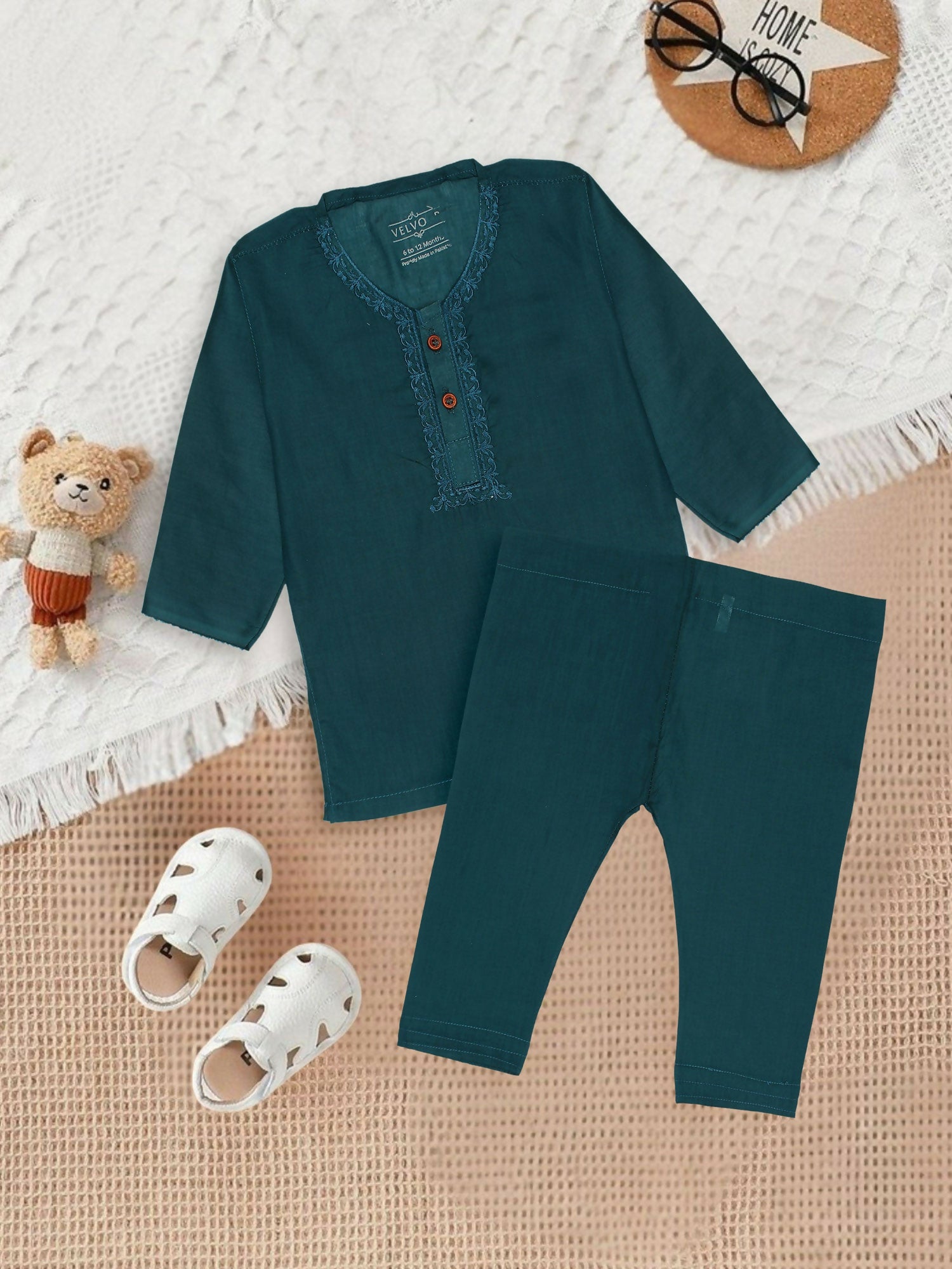 Embroidered stitched cotton kurta pajama suit with round neck, full sleeves, and regular fit, ideal for traditional and festive occasions