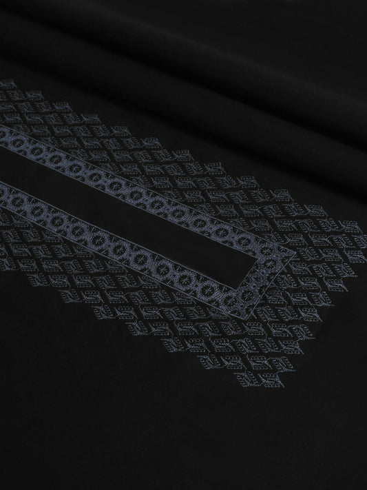 Black men’s unstitched kameez shalwar from the Cotton-Valley Collection by Fabrich'25, made from lightweight, breathable 100% Pima cotton, featuring a cotton-thread embroidered neckline with a refined signature design — complemented by designer buttons and branded finishing touches.