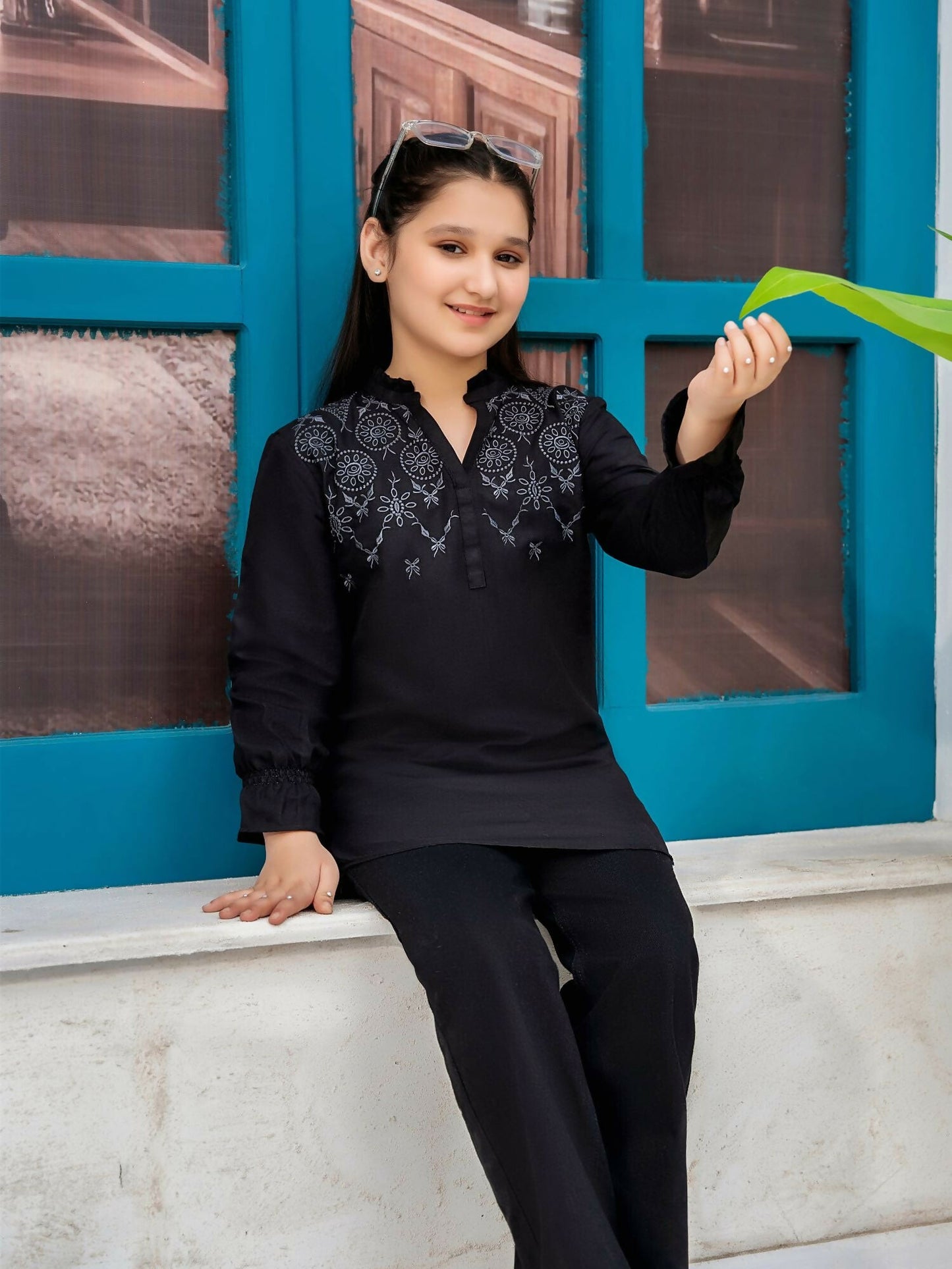 Designer girls' stitched kurti made from premium intermixed cotton, featuring full sleeves and a customized fit for kids. Breathable and soft, ideal for summer wear on both casual and special occasions.