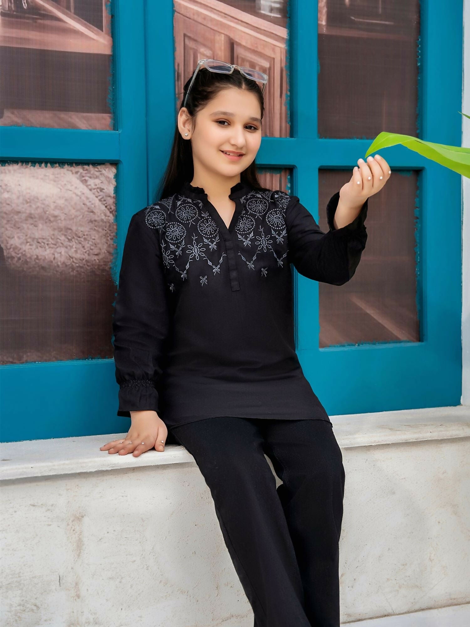 Designer girls' stitched kurti made from premium intermixed cotton, featuring full sleeves and a customized fit for kids. Breathable and soft, ideal for summer wear on both casual and special occasions.