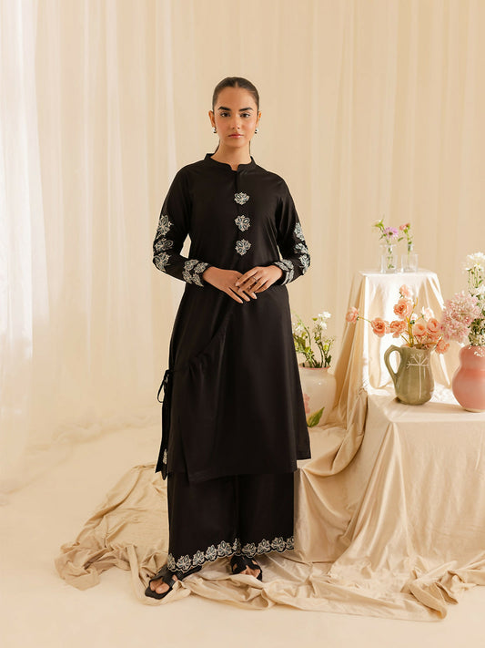 Mahnur stitched 2-piece pret suit featuring an embroidered shirt paired with embroidered trouser.