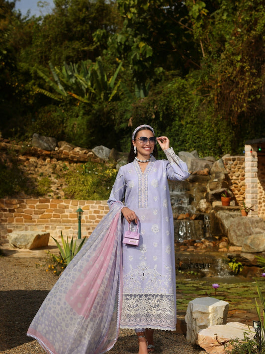 Lavender schiffli embroidered lawn unstitched 3-piece suit with polka dot chiffon dupatta by Noor Saadia Asad.