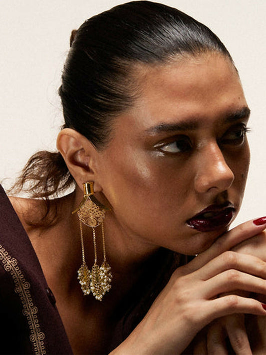 Jugnu by Hussain Rehar Blossom earrings with petal-inspired floral design, gleaming gold finish, and intricate detailing, timeless versatile accessory.